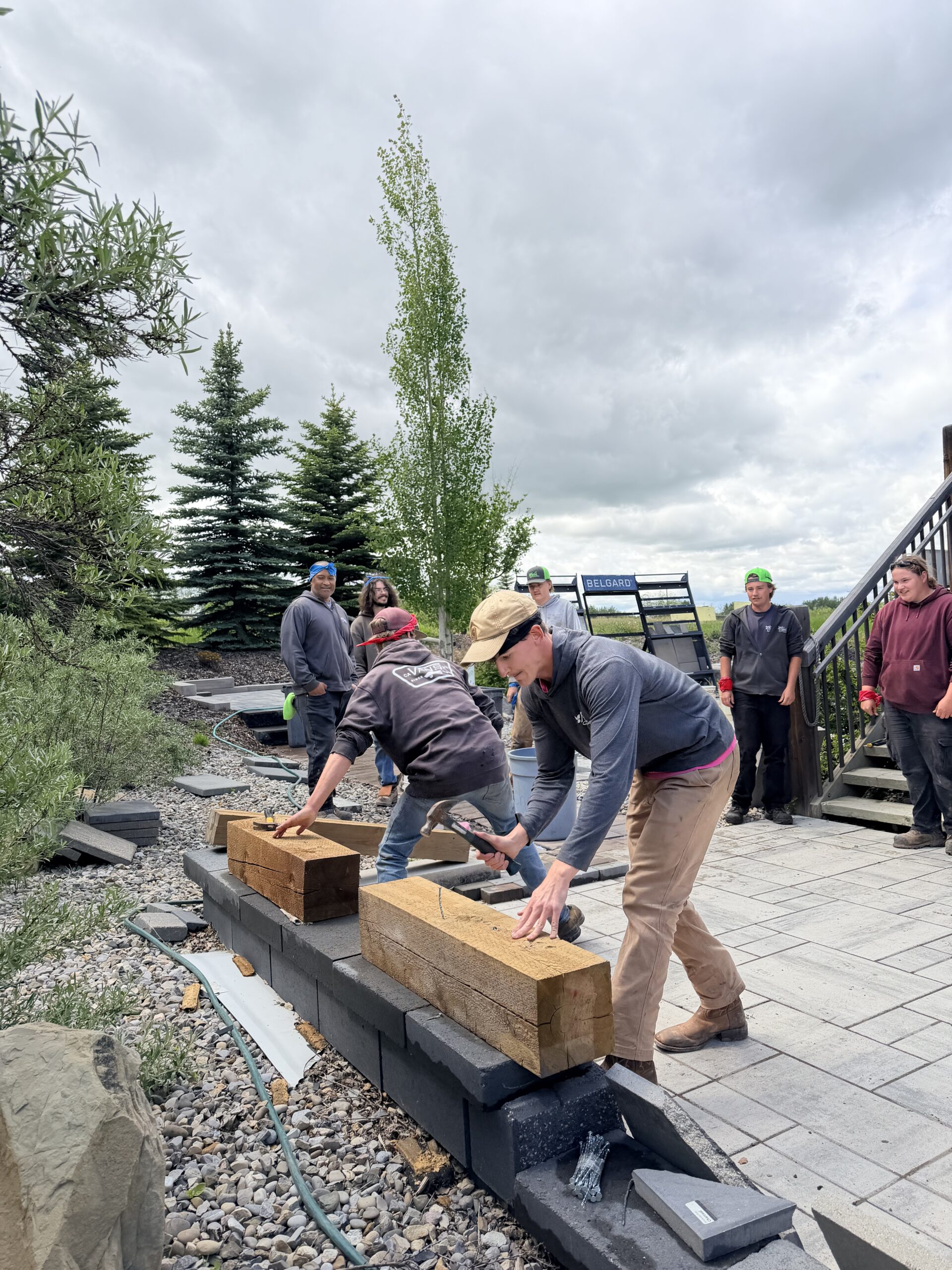Kayben crew members working together on an outdoor site